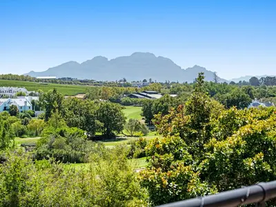 a view of a park with trees and houses at Winelands Golf Lodges 2 in Stellenbosch