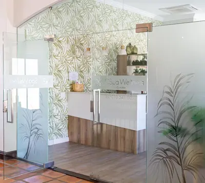 a room with a kitchen with a counter at Winelands Golf Lodges 17 in Stellenbosch