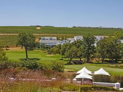 an aerial view of a golf course with a house at Winelands Golf Lodges 30 in Stellenbosch