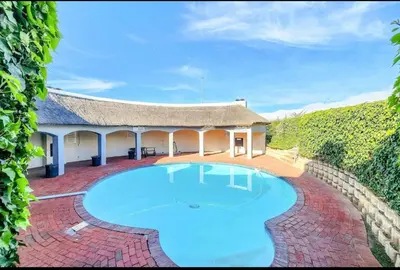 an image of a house with a swimming pool at One Bedroom Loevenstein in Tygerberg Hills