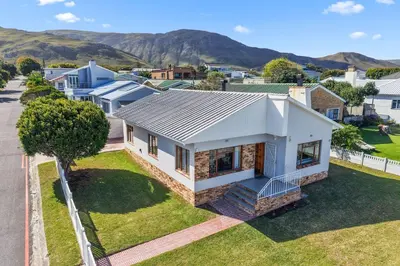an aerial view of a house in a suburb at The Kleinmond Cottage in Kleinmond