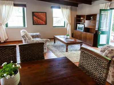 a living room with a couch and a table at The Habit Apartments in Worcester