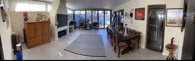 a room with a living room with a kitchen and a living room at Strand cosy 2 bedroom house in Strand