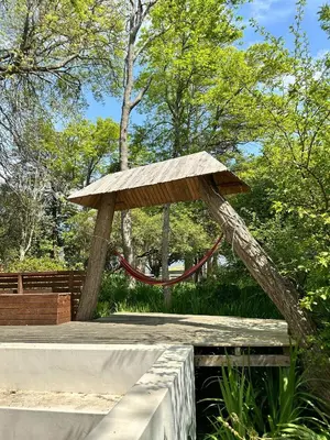 a pavilion with a hammock in a park at Rose Cottage, Elgin Grabouw in Grabouw