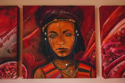 a painting of a woman on a wall at Castellon Boutique Hotel in Table View