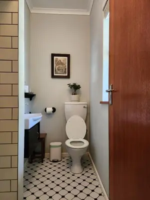 a bathroom with a toilet and a sink at Cosy en-suite room Stellenbosch in Stellenbosch