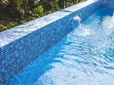 a swimming pool with a person in the water at Julinas Guesthouse in Panorama