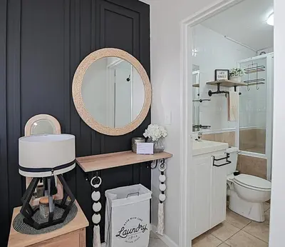 a bathroom with a sink and a mirror at SeeHUYS Boutique Bloubergstrand Beachfront Studio in Bloubergstrand