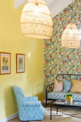 a living room with a couch and a chair at Bramley Cottage, Cheverells Farm in Grabouw