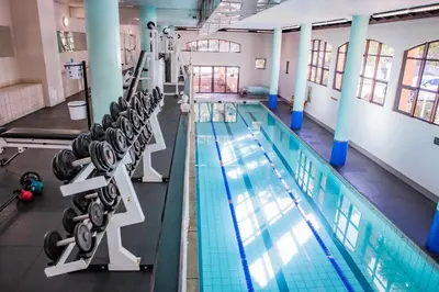a large swimming pool with several swiveling lanes at La Savina On Lake 219 The Island Club in Cape Town