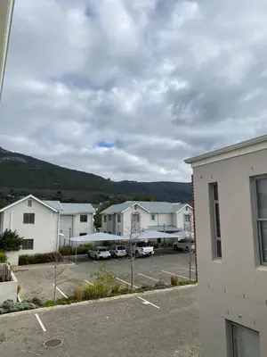 a row of houses in a parking lot at Boerbok & Bloom in Paarl
