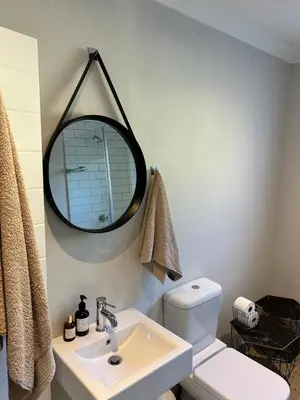 a bathroom with a sink and a mirror on the wall at Guest Suite in Stellenbosch in Stellenbosch