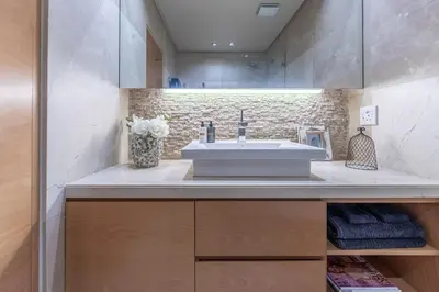 a bathroom with a sink and a counter at Dolphin View Cabana Beach House in Cape Town