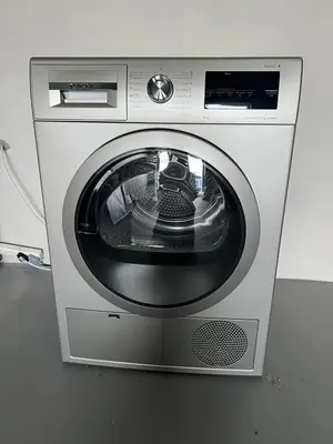 a washing machine sitting on top of a floor at Suite Vos in Hermanus