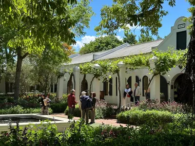 a group of people standing in front of a building at 3 Uitsig Street, Rozendal, Stellenbosch in Stellenbosch
