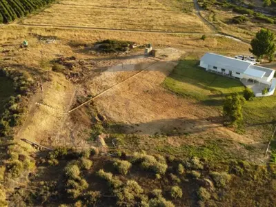 an aerial view of a house in a field at Ceres Hideaways