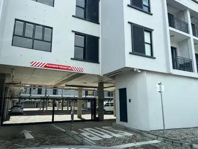 an empty parking lot in front of a building at Platform 132 - 2 On Tabak with onsite Parking in Paarl