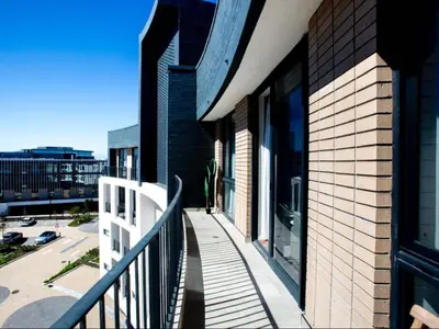 a balcony of a building with a railing at On Park Century City in Cape Town