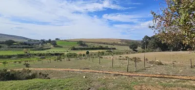 a view of a field with a fence at Hoopoe Cottage Horns op de Hoek in Hartebeest Rivier
