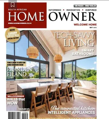 a magazine cover of a home with a kitchen and dining room at Upmarket Room in Stellenbosch