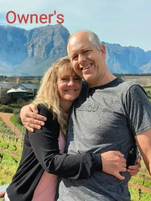 a man and a woman posing for a picture at Impletio in Gordonʼs Bay