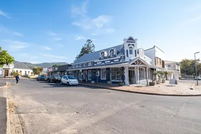 a building on the side of a street at Paarl Studio 138 - Ultra Modern Apartment with AC and onsite Parking in Paarl