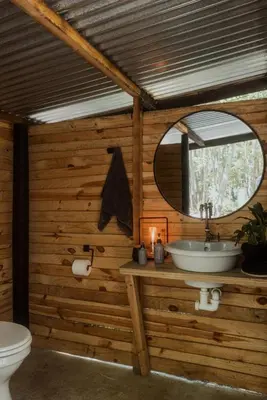 a bathroom with a sink and a mirror at Glen Oakes Farm Stay in Hartebeest Rivier