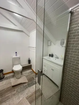 a bathroom with a toilet and a sink at Stay At Nantes in Paarl