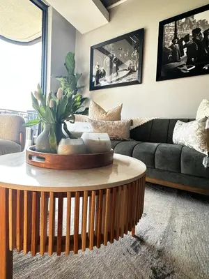 a living room with a couch and a coffee table at ON PARK 317 LUXURY APARTMENT CENTURY CiTY in Century City