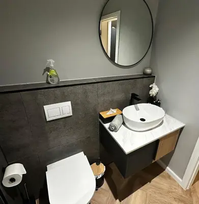 a bathroom with a white sink and a mirror at ON PARK 317 LUXURY APARTMENT CENTURY CiTY in Century City