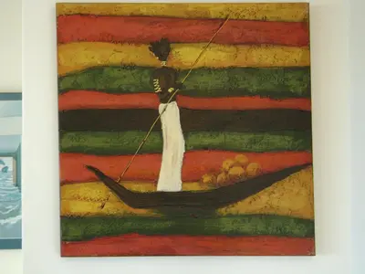 a painting of a skeleton in a boat at Aandvari Sunset Court in Cape Town