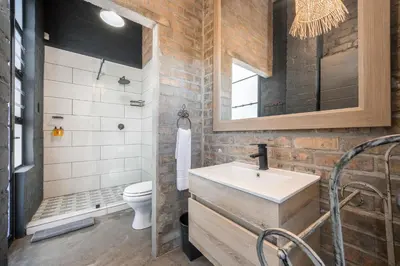 a bathroom with a white sink and a toilet at My Venue at Avemore in Onder-Papegaaiberg