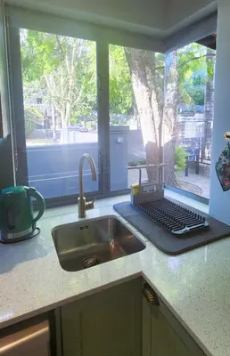 a kitchen counter with a sink and a window at Overflowing Life - Accommodation near Paarl Gim in Paarl