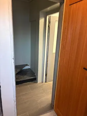 a hallway with a door leading to a room at TLP Haven in Cape Town