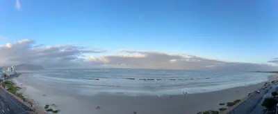 a view of a beach with people in the water at Casa Praia in Strand