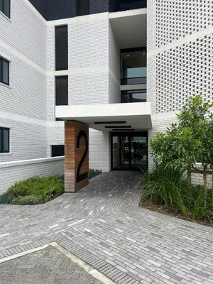 a building with a door with a number on it at The CoziPlace Lux in Cape Town