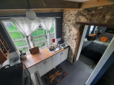 an overhead view of a kitchen with a sink and a window at Stone Cottage in Grabouw