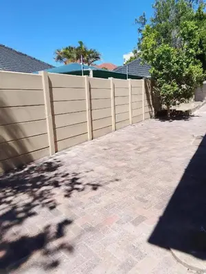 a wooden fence in front of a house at Guest Lodge on 12 Duminy in Bellville