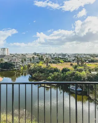 a view of a river from a balcony at Luxe watersedge apartment in Cape Town