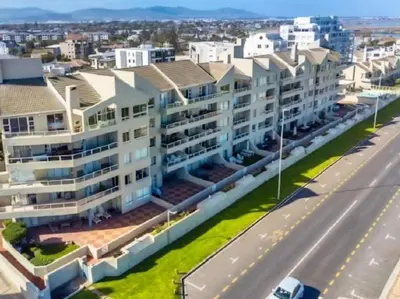 an aerial view of a building in a city at Cape Town Beachfront Accommodation in Blouberg in Bloubergstrand