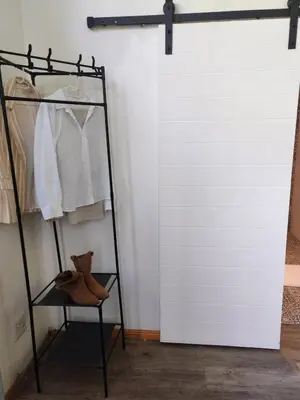 a closet with a white door and a shelf at Your Quiet Retreat Near Cape Town & Wine Country in Hoheizen