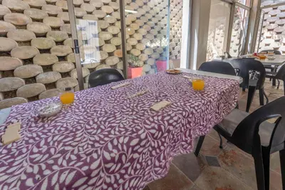 a purple table with two glasses on top of it at TwinPalace in Plattekloof