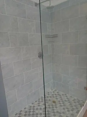 a shower with a glass door in a bathroom at Mountain View in Hermanus