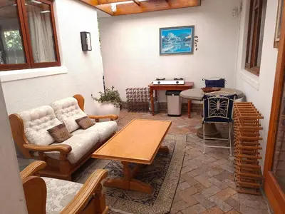 a living room with a couch and a table at 28 on Old Farm in Cape Town