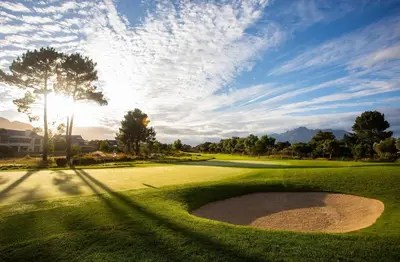 a golf course with a hole in the grass at Luxury Lodge TheView, Pearl Valley Golf Estate in Paarl