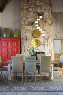 a dining room with a table and chairs at 43 On Sandstone in Somerset West