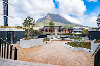 a view of a city with a mountain in the background at 504 Riverlands - Lux 2 Bedroom Apartment with Parking in Cape Town