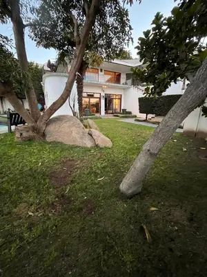 a house with two trees in the yard at Durr's Nest - Central Paarl Mountain Retreat in Paarl