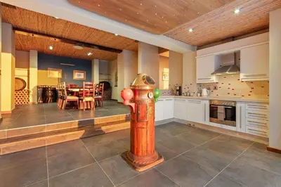 a fire hydrant in the middle of a kitchen at Villa Bezweni in Somerset West