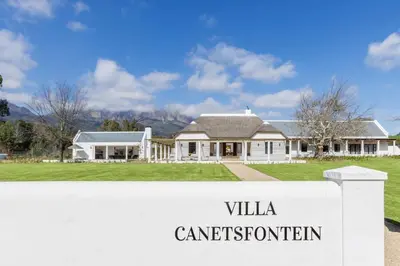 a house with a sign that reads villa cantoren at Villa Canetsfontein in Wellington
